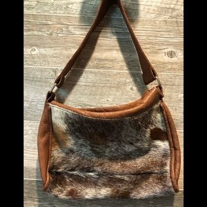 Cowhide designer handmade bag